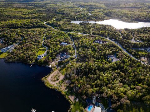 This is your opportunity to build your dream home on the lake with your very own private trail system, in the beautiful gated community of Avalon Park in Portuguese Cove! This expansive 25+ acre parcel offers 344 feet of pristine water frontage on Po...