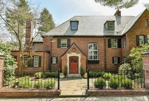 Fabulous level lot, almost an acre of beautifully manicured grounds with fountain, Koi Pond, stone patios & porches. Stunning 2024 fireplace kitchen w/radiant heat flooring & new enclosed breezeway. Dining room w/double French doors leading to a Gree...