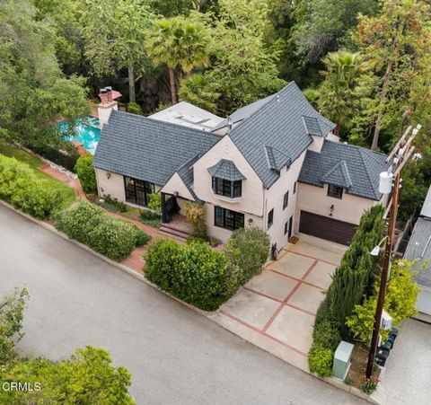 Welcome to 1602 Golf Club Dr, a one-of-a-kind Tudor and masterpiece of 1920s craftsmanship, thoughtfully updated and set in a serene, sycamore-lined canyon. Beyond 150 feet of frontage and a privacy hedge, an expansive lawn invites you under the cano...