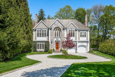 Welcome to 6 Bouton Lane - a beautifully designed Colonial offering six bedrooms in a prime location. Step into the grand three-story foyer, where elegant millwork and a sweeping staircase set the tone for this timeless home. Gorgeous skylights and e...