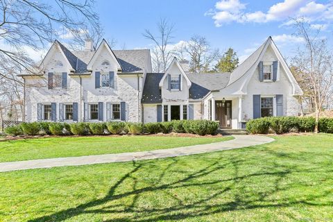 Elegant country estate w/modern enhancements offering 4 BR's, 4 1/2 baths, set on 3.69 acres. Gated entrance leads to this unique home accented by specialty stone, hardwood flooring, substantial millwork, period details & flexible floorplan conducive...