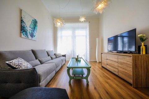 Spacious, bright and inviting apartment arranged with love in modern style with a touch of classic. With its high ceilings you will feel the apartment's history and at the same time enjoy all the benefits of modern technology. It is a perfect getaway...