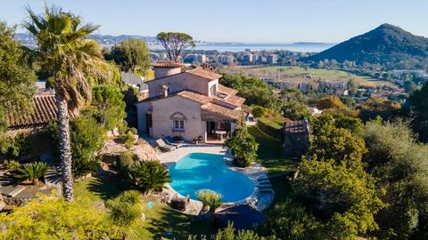 In a sought-after area of Mandelieu-La-Napoule, close to shops and beaches on foot, discover this Provencçal farmhouse full of charm and decorated with great taste. Accommodation of 300 m2 spread over 3 levels, the villa opens onto an entrance leadin...