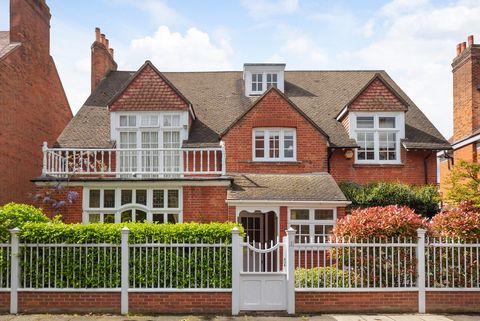 Constructed circa 1880, this distinguished residence showcases one of the most captivating designs by Norman Shaw, embodying the timeless allure of Queen Anne architecture. Among only a few such residences within Bedford Park, this Grade II listed ge...