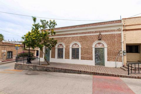 Nestled within the heart of Todos Santos this historic commercial building stands as an emblem of timeless allure. Situated in the most coveted location it sprawls across an entire city block commanding attention with its red brick fa ade that has we...