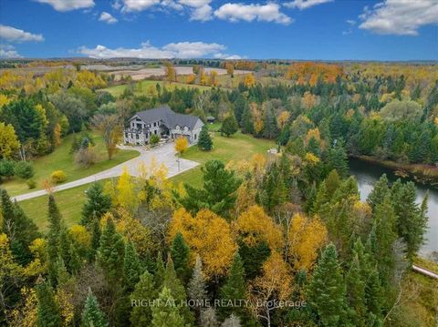 Paradise Awaits you......Modern finish, picturesque streams and ponds, in-law suite, full gym and a private primary suite all on 49.25 Acres * This Custom built 5+1 bedroom home sits on your own park like piece of property featuring Ponds, streams, w...