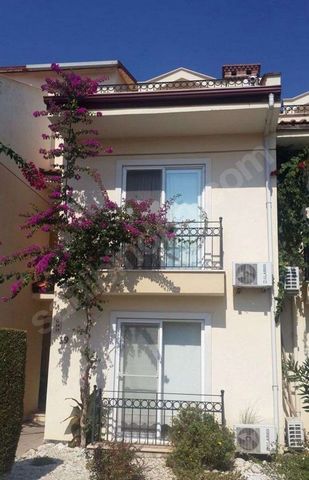 The address of unforgettable holidays... 2nd floor: Living room-Balcony-Kitchen-WC-Room with 2 single beds-Room with 1 double bed 3rd floor roof with 2 terraces : 1 bedroom-WC-2 balconies     Our house, which is intertwined with nature in Fethiye Yan...