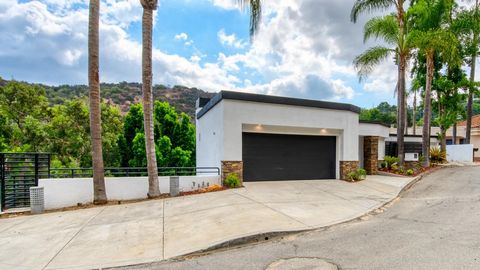 Views, Views, and more Views! Located on the Mulholland Scenic Corridor, on a quite serene street with those amazing views backing Fossil Ridge Park. A couple of blocks from The Buckley School, a college preparatory day school K -12, South of Ventura...