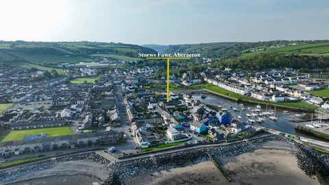 Nestled in the heart of Aberaeron, a picturesque Georgian harbour town renowned for its vibrant coloured houses and rich maritime heritage, Storws Fawr presents a unique opportunity to own a piece of history. Originally constructed in 1870 as a ship'...