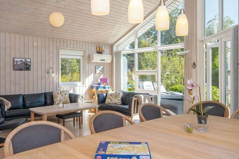 A holiday cottage with whirlpool and sauna, and equipped with everything for the perfect holiday, both indoor and outdoor. The house is surrounded by several terraces, so you can always find a sheltered spot. Several of the beds are elevated and ther...