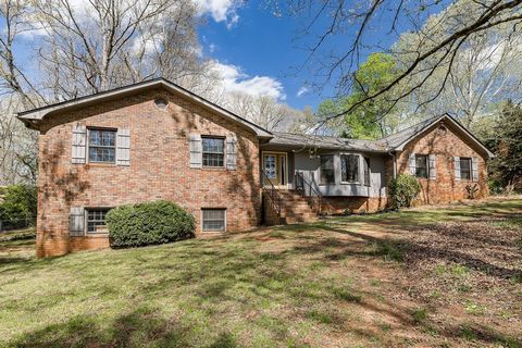 Here it is, your brick ranch over a basement in Oconee County's Hickory Hill neighborhood. Nestled on a deep lot, this spacious property has plenty of room inside and out! Nearly 4000 square feet of living space, this home has endless possibilities f...
