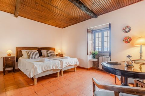 Palheiro B is one of the 6 fully equipped apartments of Quinta Santo António, a Rural Tourism farm, located in the northwest of Portugal, with a fantastic swimming pool and gardens, shared by the guests, of which you may enjoy incredible views of Min...