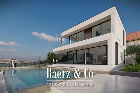 Zadar, Pag, modern and luxurious villa is located first row by the sea, on a plot of 521 m2. The villa is spread over two floors. The ground floor consists of an entrance area, a modern kitchen and dining room (26.38 m2), a spacious living room of 22...