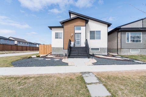 Offers anytime - a GREAT opportunity! Welcome to your new home in the picturesque Crocus Meadows. Step into a spacious & inviting foyer, flooded with natural light. This modern bungalow is designed with an open concept layout that maximizes space, id...