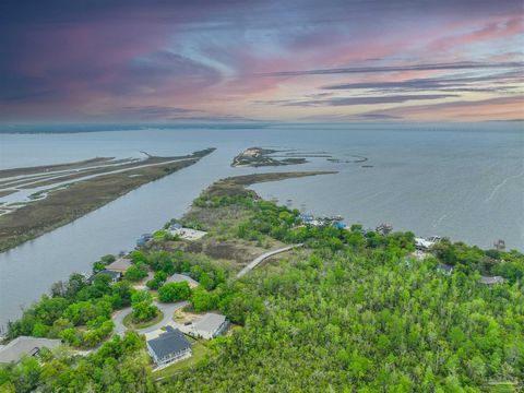 Wow! Amazing Waterfront Community of Mackey Coves is nestled between Escambia Bay and Escambia River and conveniently located in East Pensacola near I10, and Hwy 90. Close to UWF, West Florida Hospital, this vacant homesite is perfect for your dream ...