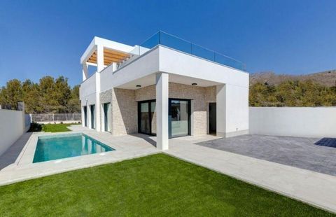This development consists of 12 luxury modern style villas in a quiet residential area in Finestrat The main floor consists of a spacious living room with an open kitchen three bedrooms and two bathrooms From the living room we access a large solariu...