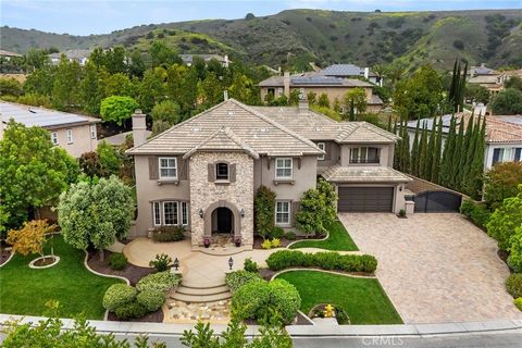 This Opulent Sanctuary (WITH A FLOORPLAN SELDOM EVER LISTED) is nestled within the prestigious Kerrigan Ranch enclave of Yorba Linda. Beyond the serene cul-de-sac setting, this immaculate residence boasts a perfect blend of luxury, functionality, & e...