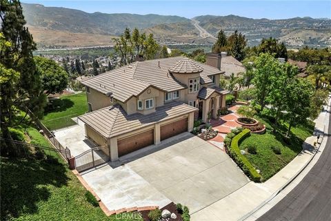 THE ONE YOU'VE BEEN WAITING FOR! ***Perched high on the scenic hills of Yorba Linda, where luxury meets comfort in this exquisite residence. This property boasts a beautifully designed hardscaped and landscaped front yard, offering impressive curb ap...