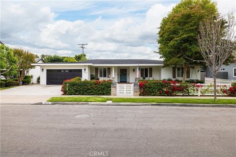 Just moments from the exclusive Mesa Verde Country Club, this single-level, picture-perfect Mesa Verde residence is nestled on one of the best streets in the 'inner loop', offering the convenience of driving your golf cart to the club. The off-the-ch...