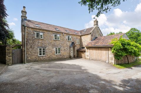 Originally a mid-1700s built farmhouse and old dairy, Church Cottage now stands as a fully renovated and sympathetically modernised four-bedroom home set within a pretty walled garden. Positioned on the border of the Cotswolds and the Mendip Hills, t...