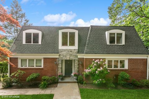 Welcome to your dream home! Nestled amidst lush greenery and boasting seasonal river views, this 5-bedroom, 4.5-bathroom residence offers a serene escape in a wonderful location, walkable to Main Street and the Metro North train station. Upon enterin...