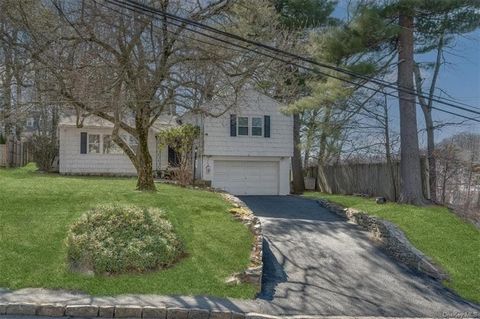 Edgemont at its best! This bright and spacious multi level home has been restored, and is just steps to Seeley School. Large front yard with mature trees and charming stone walkway. The first level offers a welcoming foyer area with a double coat clo...