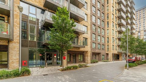 We present a stunning sixth-floor apartment in Chorley Court, Madeira Street, Poplar E14, within Bellway Homes Lansbury Square development near Canary Wharf. The accommodation features an extensive semi-open-plan reception room and kitchen with integ...