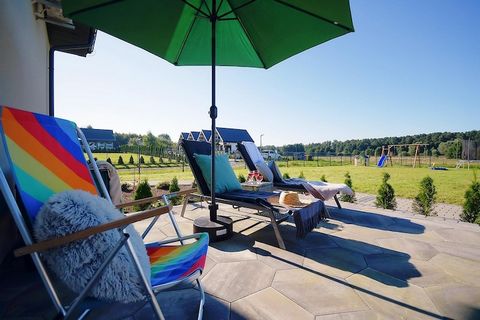 On the edge of a charming seaside settlement, there is a family holiday resort, which offers accommodation in two-story terraced houses and plenty of green space for children to play various games and have fun. Two-story holiday homes with terraces a...