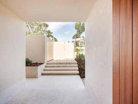 Casas da Areia II - where the Atlantic breeze meets the lush greenery of nature Villa with 5 bedrooms, private pool and 646.25sq.m of gross construction area. In Birre, at the heart of the Cascais municipality and just steps away from the iconic Quin...