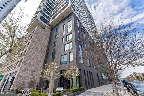 Welcome to luxury living at its finest in this exquisite condo with 2 bedrooms, 2 baths, & Den area at The Verse, Tysons Lux residential building. With 9.5 ft ceilings and floor-to-ceiling windows the natural light floods the open-concept floor plan,...
