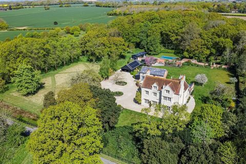 OVERVIEW GUIDE PRICE £2,400,000 TO £2,600,000 This exquisite residence is a masterpiece of architectural heritage, designed by the renowned 19th-century architect Edward Blore, famed for his work on Buckingham Palace. Set within stunning landscaped g...