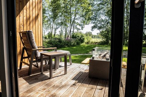 Vakantievilla Amalia 2 met sauna en hottub Vakantievilla Amalia 2 met privé sauna en hottub beschikt over een knusse woonkamer met een open keuken. De keuken is volledig ingericht en voorzien van een koelkast met vriesvak, vaatwasser, inductiekookpla...