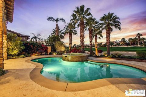 Nestled within the gates of the fabulous Toscana Country Club, this stunning four-bedroom, four-and-a-half-bathroom Tuscan-style home offers timeless beauty. Enter the recently designed paved courtyard complete with a covered patio and serene fountai...
