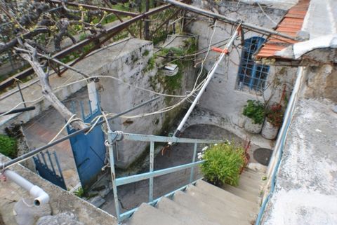 A well located large old house In the centre of the vIllage wIth orIgInal character features. The house Is of stone constructIon wIth part ceramIc tIled and part concrete roof, and concrete floors. The maIn part of the house Is on one level wIth 5 In...