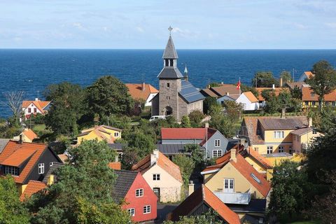 Parc de vacances Gudhjem & # 8212; vacances sur l'île ensoleillée Maisons de vacances de style Bornholm à 10 min du port et à 5 min de la plage. Le point de départ de la famille pour des voyages à Helligdomsklipperne, Paradisbakkerne, Christiansø m.v...