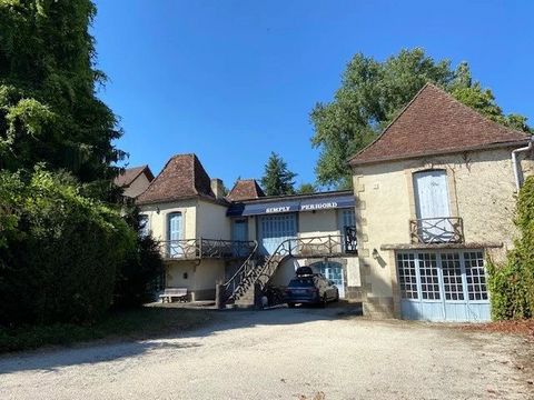 The Old Tannery - lovely stone property for renovation in the heart of a small riverside town in the Vezere Valley of the Dordogne with lovely views over the lake behind. The property consists of a spacious Longère style house with around 189 m2 of l...