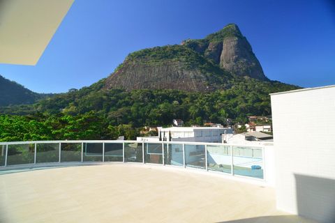 Ce magnifique penthouse dispose de 2 grandes chambres impeccables, dont une suite. Grand balcon gastronomique de près de 60m et belle vue sur Pedra da Gávea. La propriété dispose également d’une serrure biométrique à l’entrée de l’appartement, d’une ...