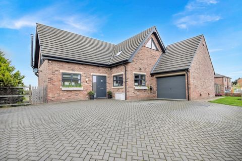 A beautifully presented detached family home boasting stunning views unspoilt over open countryside. The property is finished to the highest standard throughout and sees four double bedrooms, a spacious vaulted living area and a well equipped kitchen...