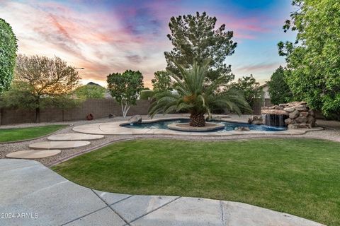 A sense of calm awaits you when you walk through the door of this desirable single story Stetson Court home nestled on a beautiful N/S facing oversized corner lot. The backyard sanctuary features a custom-built pool with grotto, waterfall, and island...