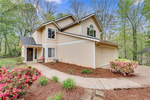 Nestled on top of a gentle hill with a long driveway lined with blooming landscape, you will find this charming 3-bedroom home. The welcoming entrance foyer leads into the fireside family room flooded with natural light and a vaulted ceiling. Ideal s...