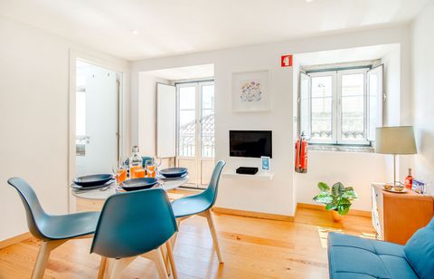 A charming apartment with a view over the Tagus River and the Alfama neighborhood, the most typical and historical neighborhood in the heart of Lisbon. The building is located in a traditional street near the Fado Museum, the National Pantheon and th...