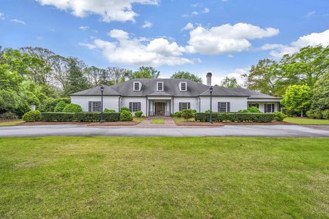 Exquisite traditional, custom built home on Spartanburg's eastside that is truly one of a kind. Designed by architect, Al Jolly, the home was constructed in 2012 and includes 5 bedrooms, 6 full bathrooms and 2 half baths. The master suite has separat...