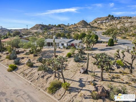 Incredible views unlike any other! This charming and well maintained California Ranch exudes charm and panache. Prominently sited above the street for privacy and enjoying the spectacular vistas the the sought after Western Hills Estates, this 1958 h...