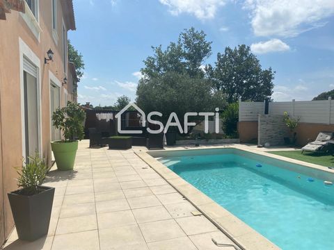 Large Occitan bastide with 7 rooms located on land laid out in differentiated zones (swimming pool, bio-climatic terrace, barbecue area, children's play area, wood storage, etc.) with a beautiful living room with kitchen area with central island and ...