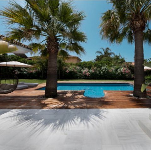 EXQUISITE BEACHSIDE VILLA Experience the epitome of coastal luxury at this magnificent villa nestled just moments from the shores of the Mediterranean Sea in Marbella. Situated in the exclusive Marbesa residential area, this exquisite beachside retre...