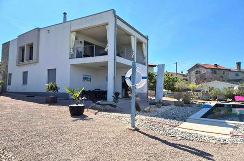 The island of Krk, Malinska, wider area, detached house surface area 153 m2 for sale, with pool, sea view and large garden of 450 m2. The house consists of ground floor with three bedrooms, two bathrooms, hallway and terrace, and the first floor with...