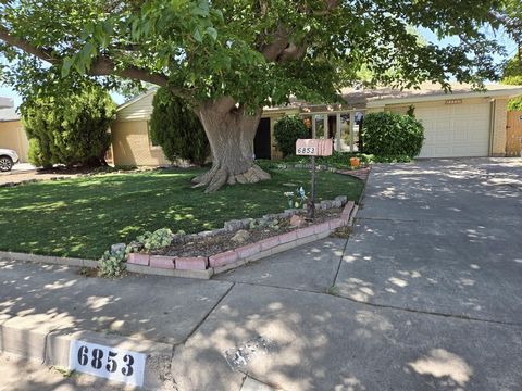 GEM ALERT! Loved & maintained Mossman home in the heart of ABQ with refrig air!! Owned ~ 60 yrs generations of family gatherings. 3/2, pitched roof. When walk in you'll feel the love. Enter into the living rm plenty of space for any sized furn/TV, wo...