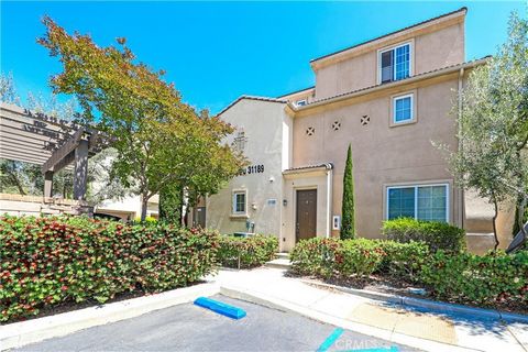 Welcome to 31189 Black Maple Drive, a stunning three-level townhome located in the desirable Temecula Lane gated community. This beautifully designed home offers 1,107 square feet of comfortable living space, featuring 2 bedrooms and 2 bathrooms. Upo...