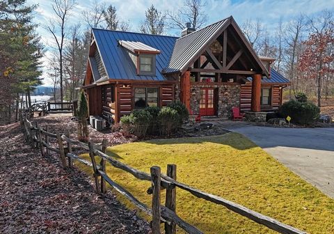 Exquisite Lakeside Retreat: Your Log Cabin Oasis. Nestled along the tranquil shores of Lake Blue Ridge, this spectacular log cabin epitomizes the essence of rustic luxury living. Less than 5 miles from the charming town of Blue Ridge, yet tucked away...
