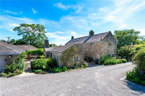 Stepping into the entrance hall, you'll be bathed in natural light, courtesy of the stunning leaded glass window that overlooks the decorative pond at the rear of the property. The hall exudes elegance with its beautiful flagstone flooring and cast i...